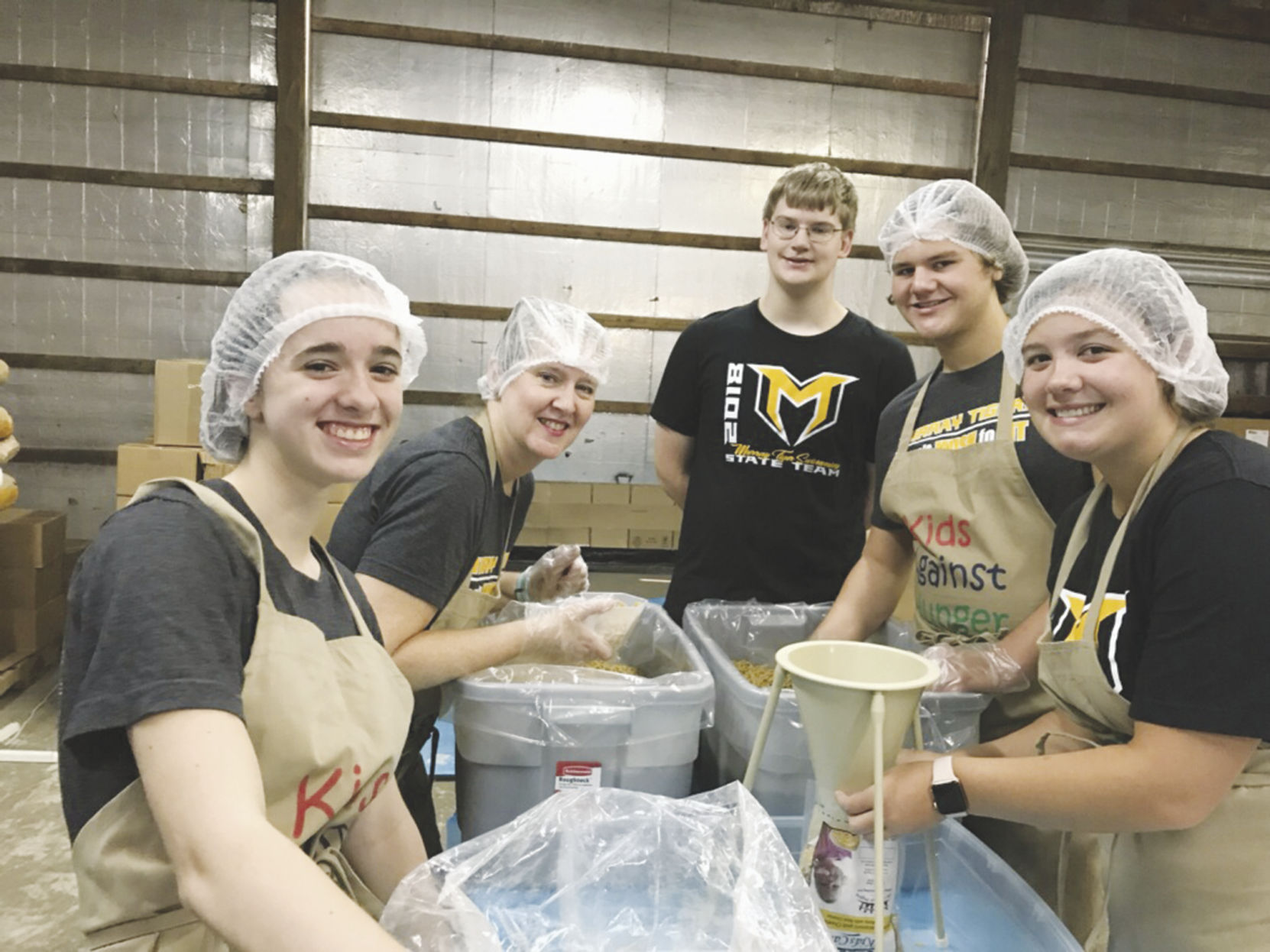 MHS Swim Team lends a helping hand